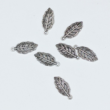 Charm pluma (unidad)
