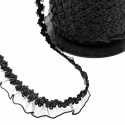Puntilla elástica negra con volante